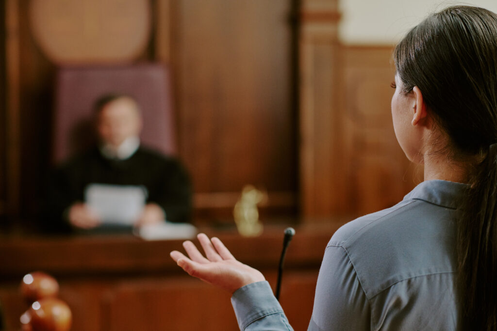 Woman Speaking to a Judge in Court