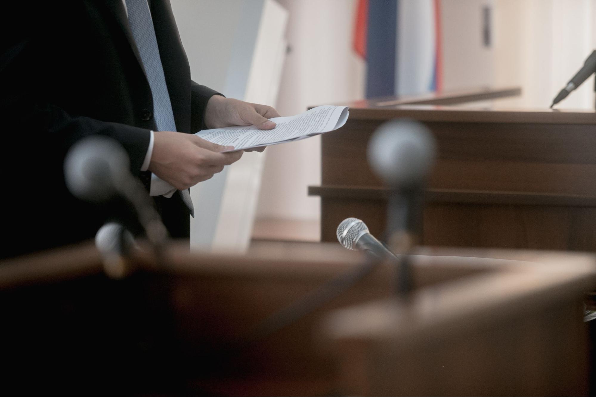 image of lawyer presenting case in courtroom