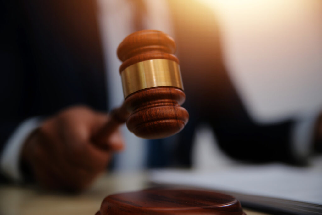 Law theme, gavel or mallet of the judge, lawyer enforcement officers, evidence-based cases taken into account in the court abount business, legislation.